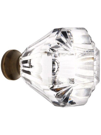 German Crystal Fluted Octagonal Knob With Solid Brass Base In Antique Brass.